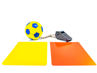 Soccer ball and referee whistle with cards on a white background. Sport. Championship. Europe....