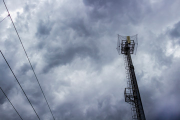 Obraz premium Cell tower of the Dimitrovgrad, Haskovo Province Bulgaria railway station under overcast sky, low-angle view