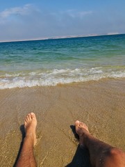 feet on the beach