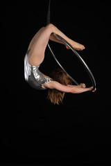 Brunette acrobat on a lyra © Harris Shiffman