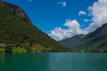 Naklejka na ściany i meble Beautiful lake Oldevatnent in Stryn, Norway. July 2019