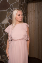 Young beautiful stylish girl in modern interior.