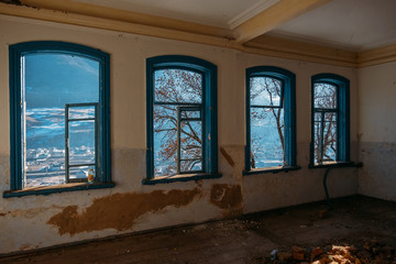Fototapeta premium Interior of messy dirty room at old abandoned building
