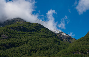 Mountains over the beautiful lake Oldevatnent in Stryn, Norway. July 2019