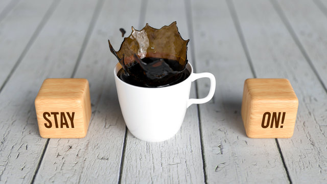 cup of coffee and cubes with text STAY ON on wooden background