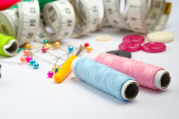 Sewing equipment on white background