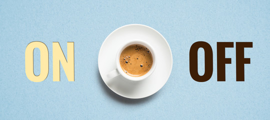 cup of coffee and cubes with text ON and OFF on paper background