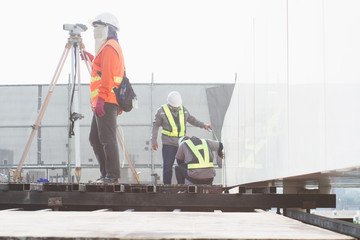 The engineer ,surveyor ,staff man  and laborer works together in there site construction and built a strong team in his department.