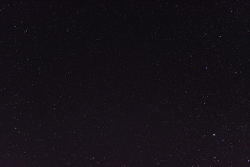 starry night sky with extremely clear conditions making a lot of constellations visible as well as...