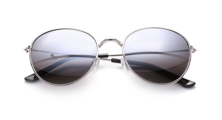 Stylish sunglasses on white background