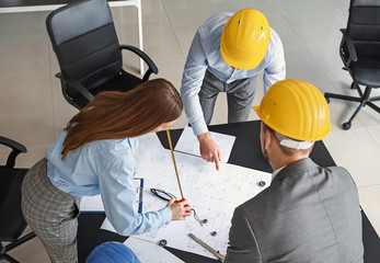 Group of engineers working in office