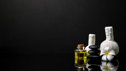 Spa composition with spa accessories on dark background
