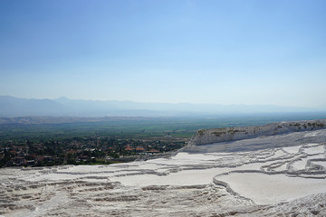 Panoramic view of the beautiful white Travertines terrace of Pamukkale landscape