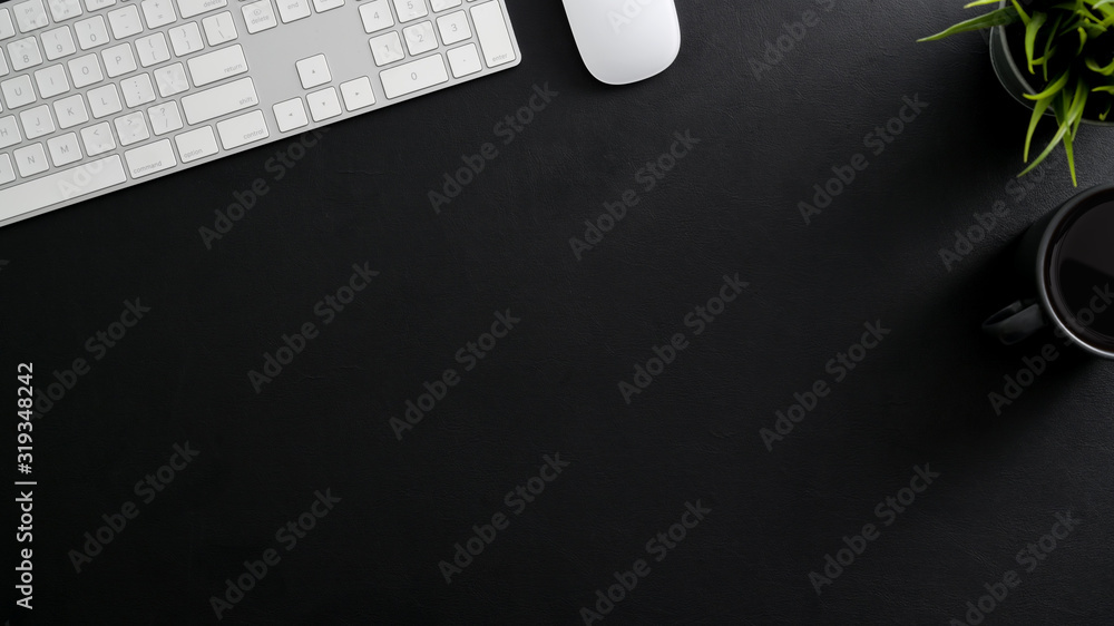 Fototapete overhead shot of dark modern workspace with computer keyboard, coffee cup and copy space