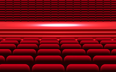 Red chairs and stage in the theater	