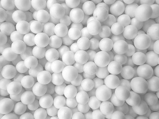 Background of white circle styrofoam ball pattern texture foam surface abstract background