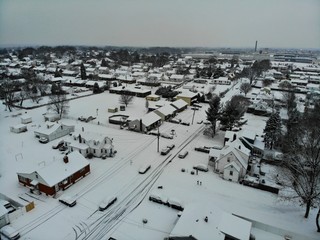 Obraz premium The aerial view of residential area after a snowstorm near Wilmington, Delaware, U.S.A