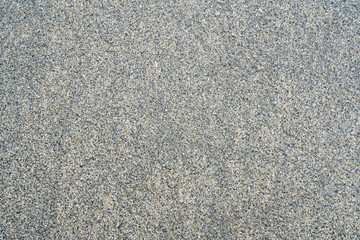 Sand background on the shore of ocean