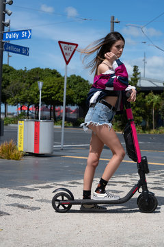 Teenager on electric scooter