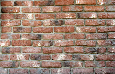 Vintage brickwork background of the 19th century. Very old bricks survived more than 100 years.