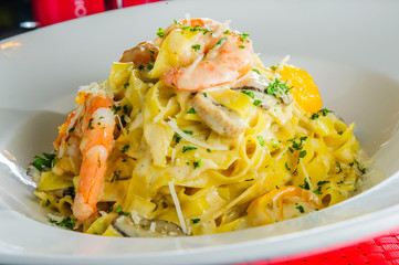 Pasta with shrimp on a plate.Sea food pasta.