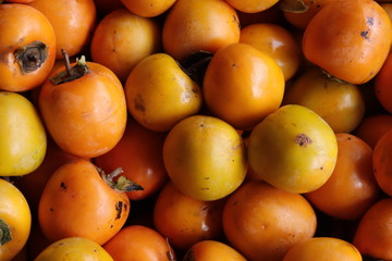 Raw persimmon preparing to hanging to make dry japanese persimmon (hoshigaki)