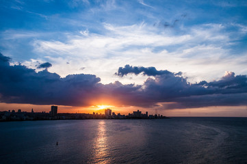 Sunset over the sea. Looking at Havana City, Cuba.