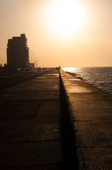 Malecon of Havana,  Cuba. Sunset in the golden city. 
Travel locations: Caribbean, Cuba. 