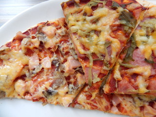 pieces of pizza on top of each other