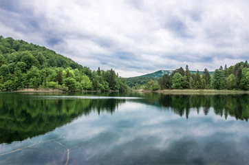 Lake view, Plitvice Lakes National Park, Plitvice, Croatia. View of the lake in summer with clouds, Plitvice Lakes National Park, Croatia
