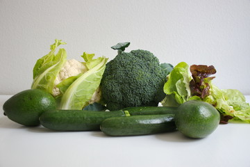 Healthy fresh vegetables on the white table