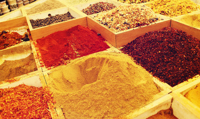 spices and herbs, Multicolored spices in a wooden organizer, top view. Seasoning background - 319365237