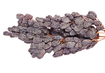 Cluster of raisins isolated on a white background.