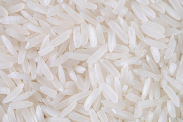 Close-up of white rice seed texture background. Organic, natural long rice grain, food for healthy....