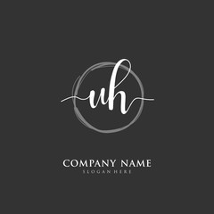 Handwritten initial letter U H UH for identity and logo. Vector logo template with handwriting and signature style.