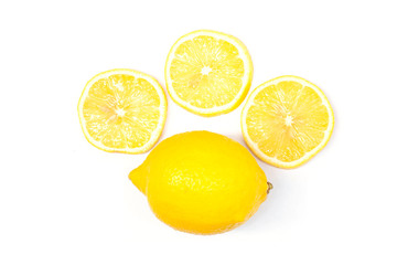 Whole and sliced pieces lemons isolated on white background.
