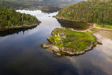 Aerial drone shot of Castle Tioram, Scottish Highlands.