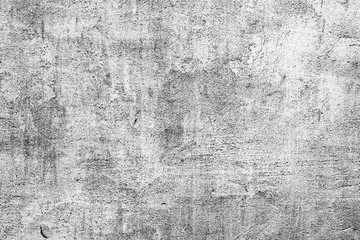 Texture of a concrete wall with cracks and scratches which can be used as a background
