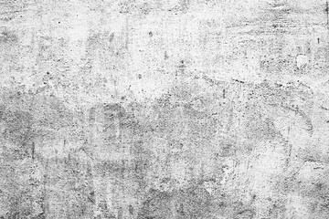 Texture of a concrete wall with cracks and scratches which can be used as a background