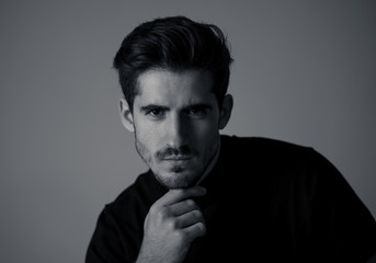 Young attractive latin man posing looking sensual and handsome. Beauty concept and lifestyle