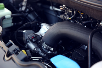 Closeup view of engine bay in modern car