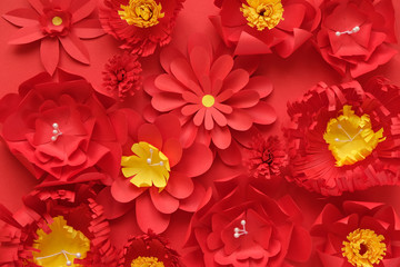 Hello, spring. With red paper flowers on red