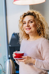 Portrait of blond curly female