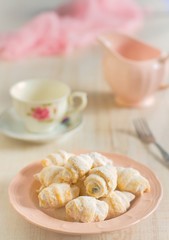 Homemade shortbread cookies with icing sugar to be served with tea or coffee