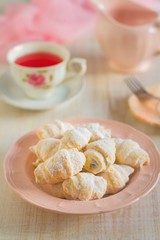 Homemade shortbread cookies with icing sugar to be served with tea or coffee