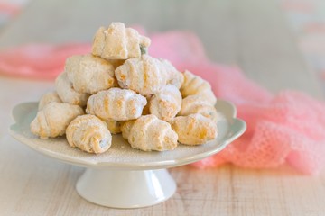 Homemade shortbread cookies with icing sugar to be served with tea or coffee