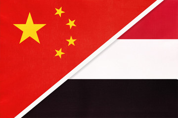 People's Republic of China or PRC vs Yemen national flag from textile. Relationship between two asian countries.