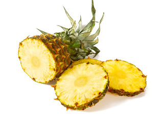 fresh pineapple slices isolated on white