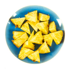 pieces of pineapple isolated on white