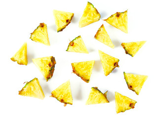 pieces of pineapple isolated on white